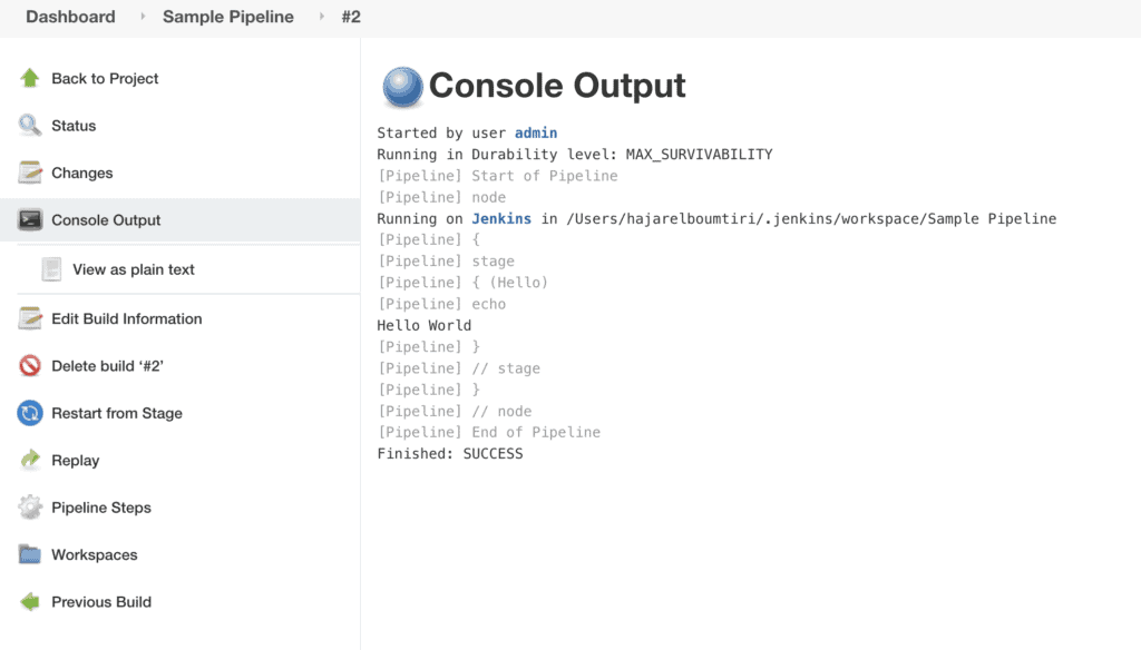 Jenkins console output showing the pipeline execution with a Hello World message and a successful build.